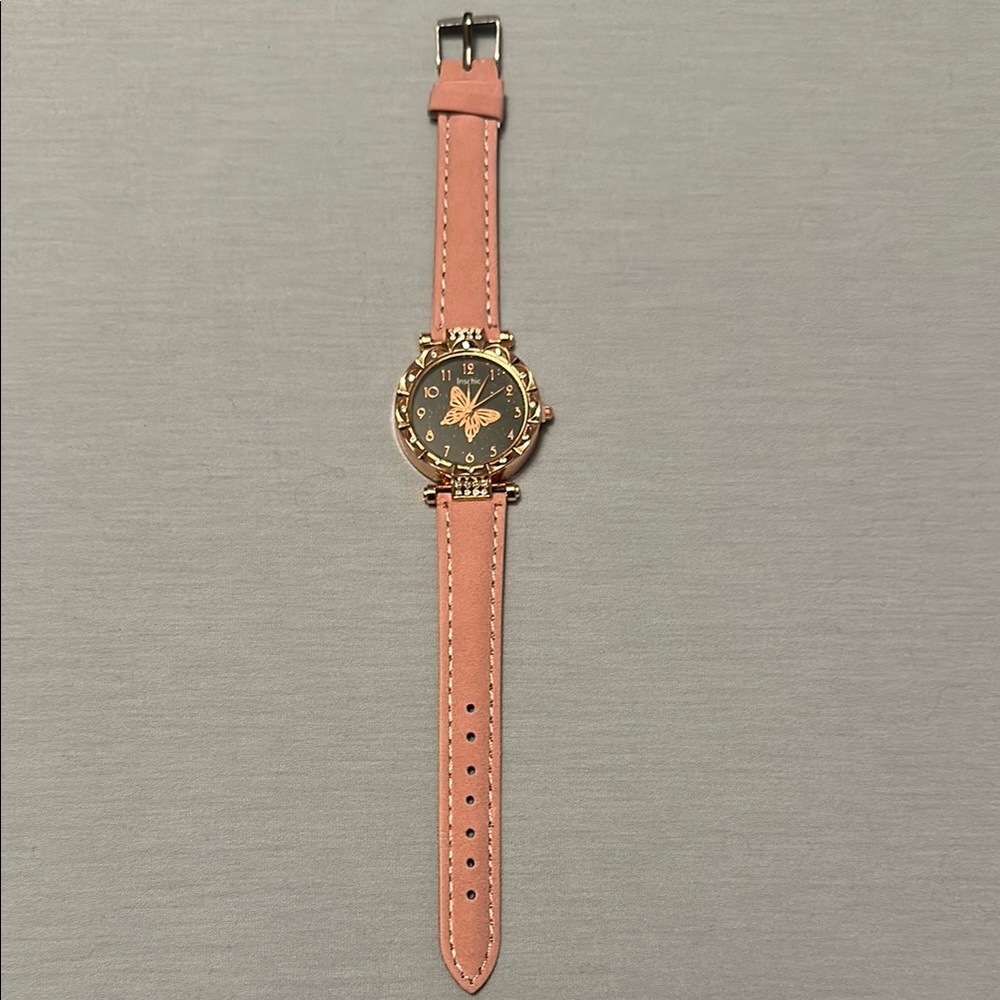 Elegant Pink Watch with Gold Accents